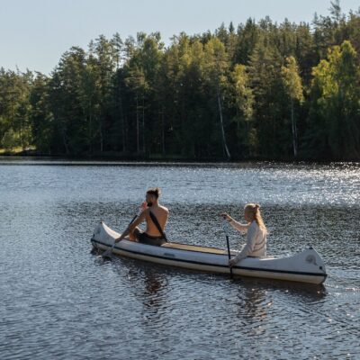 Affordable yoga retreat in Sweden: a Just Be guest swimming in the lake at Shambala
